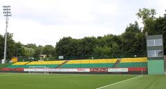 South stand of the LFF stadium with spectators and green field