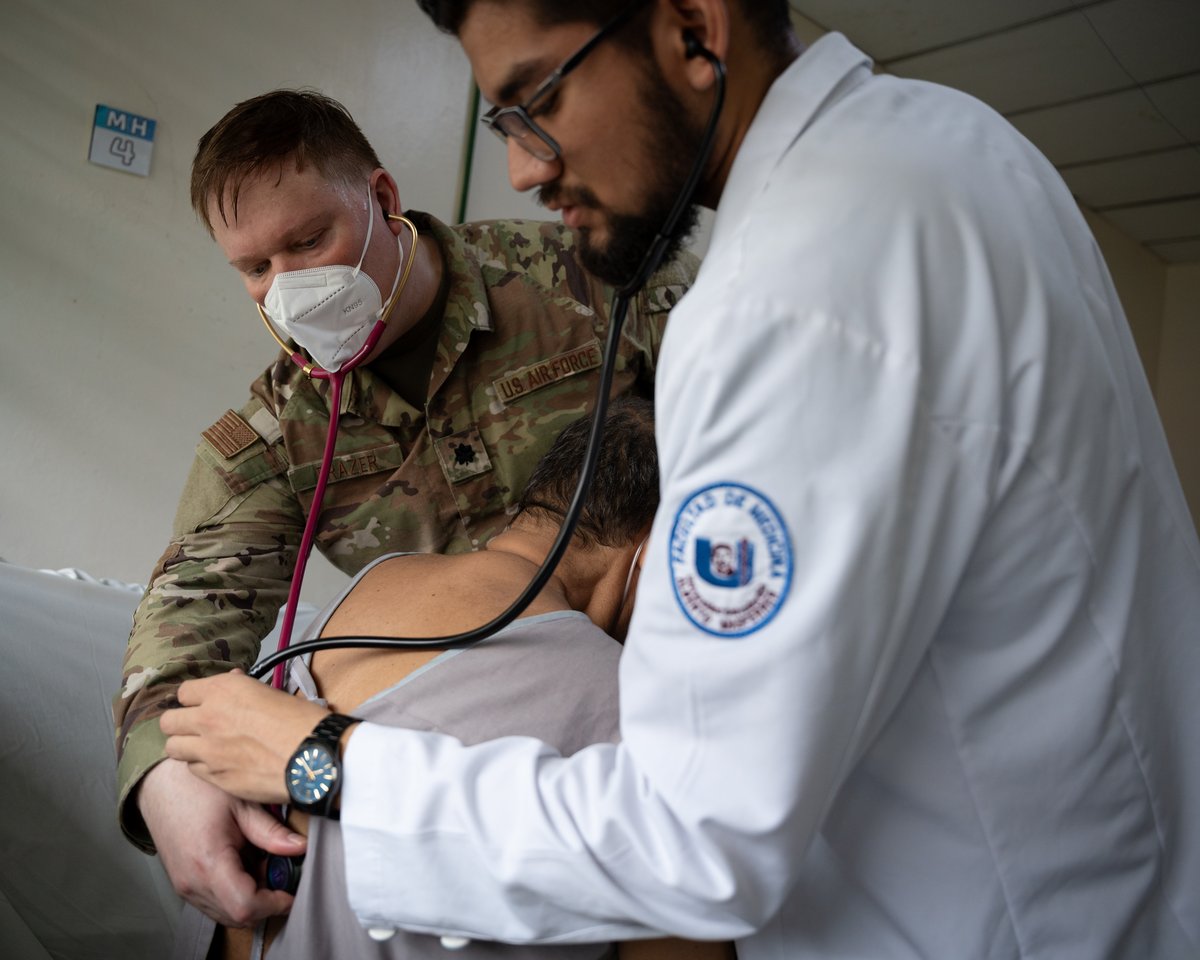U.S. Air Force medical personnel examining patient lungs at San Bartolo National Hospital in El Salvador during AMISTAD 2025