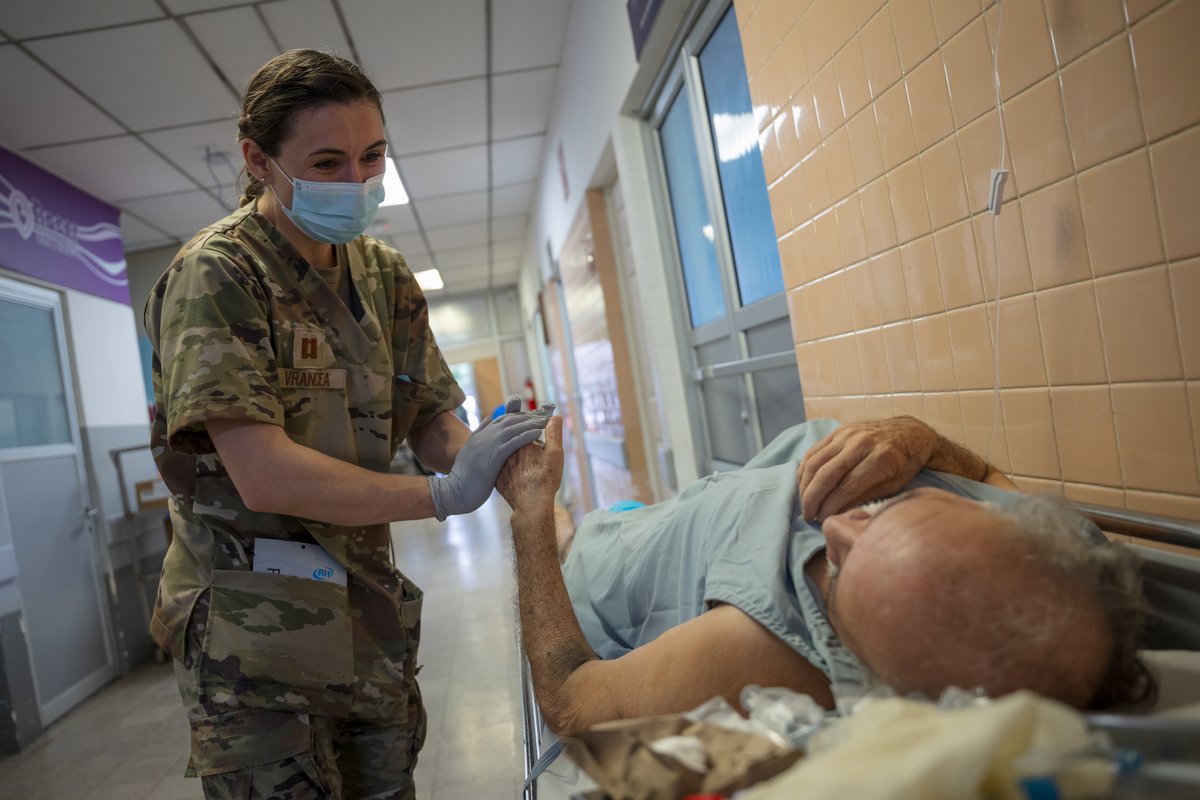 U.S. Air Force nurse providing medical care to patient at San Bartolo National Hospital in El Salvador during AMISTAD 2025 campaign