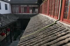 Inner yard of Jade Buddha Temple in Shanghai with traditional Chinese architecture and garden