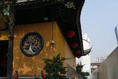 Jade Buddha Temple exterior in Shanghai with traditional Chinese architecture and intricate roof details