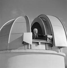 Professor Luigi Carmera in the Naples Observatory with scientific instruments, 1938