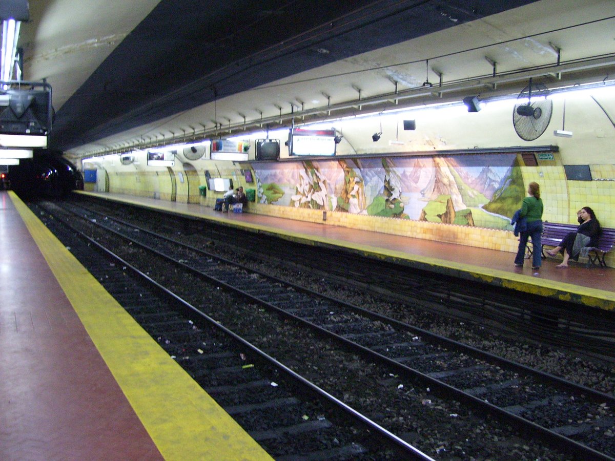 Subte Pichincha station interior with platforms and trains in Buenos Aires