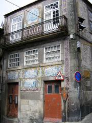 House with traditional azulejos tiles decoration on São Miguel street in Porto, Portugal