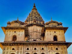 Orchha Chhatris Bundela Rajput funerary monuments with domed canopies along Betwa River in Madhya Pradesh India