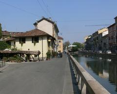 Naviglio canal in Milan with historic buildings and boats