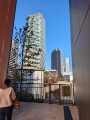Azabudai Hills urban complex on opening day with modern high-rise buildings and landscaped green areas