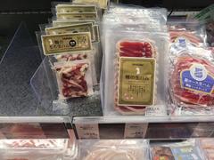 Azabudai Hills Market displays duck prosciutto and duck thigh prosciutto in Minato, Tokyo