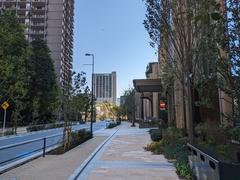 Azabudai Hills urban development on opening day with modern buildings and green spaces