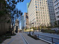 Azabudai Hills development on opening day with modern high-rise buildings and green rooftop gardens