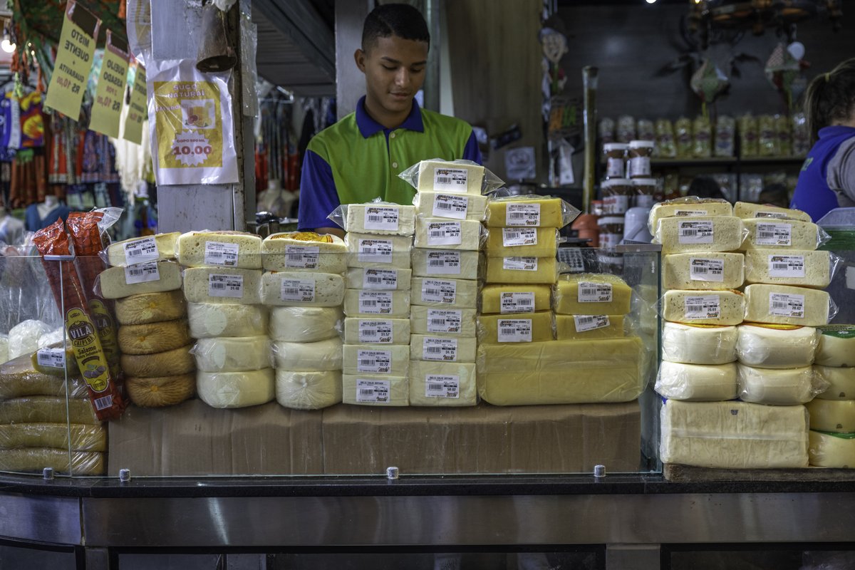 Traditional Brazilian dairy products including queijo minas cheese, coalho cheese, and butter displayed at Centro Luiz Gonzaga de Tradições Nordestinas in Rio de Janeiro