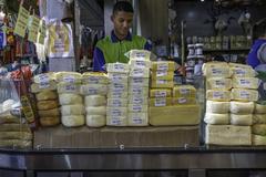 Traditional Brazilian dairy products including queijo minas cheese, coalho cheese, and butter displayed at Centro Luiz Gonzaga de Tradições Nordestinas in Rio de Janeiro