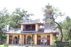 Gate and Phuoc Duyen Tower of Thien Mu Pagoda viewed from inside