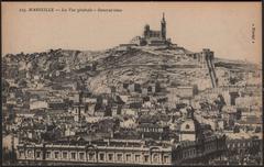 General view of Marseille city with buildings and coastline under a clear sky