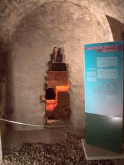 Interior view of Baños del Alcázar Califal in Córdoba showcasing ancient Islamic bath architecture