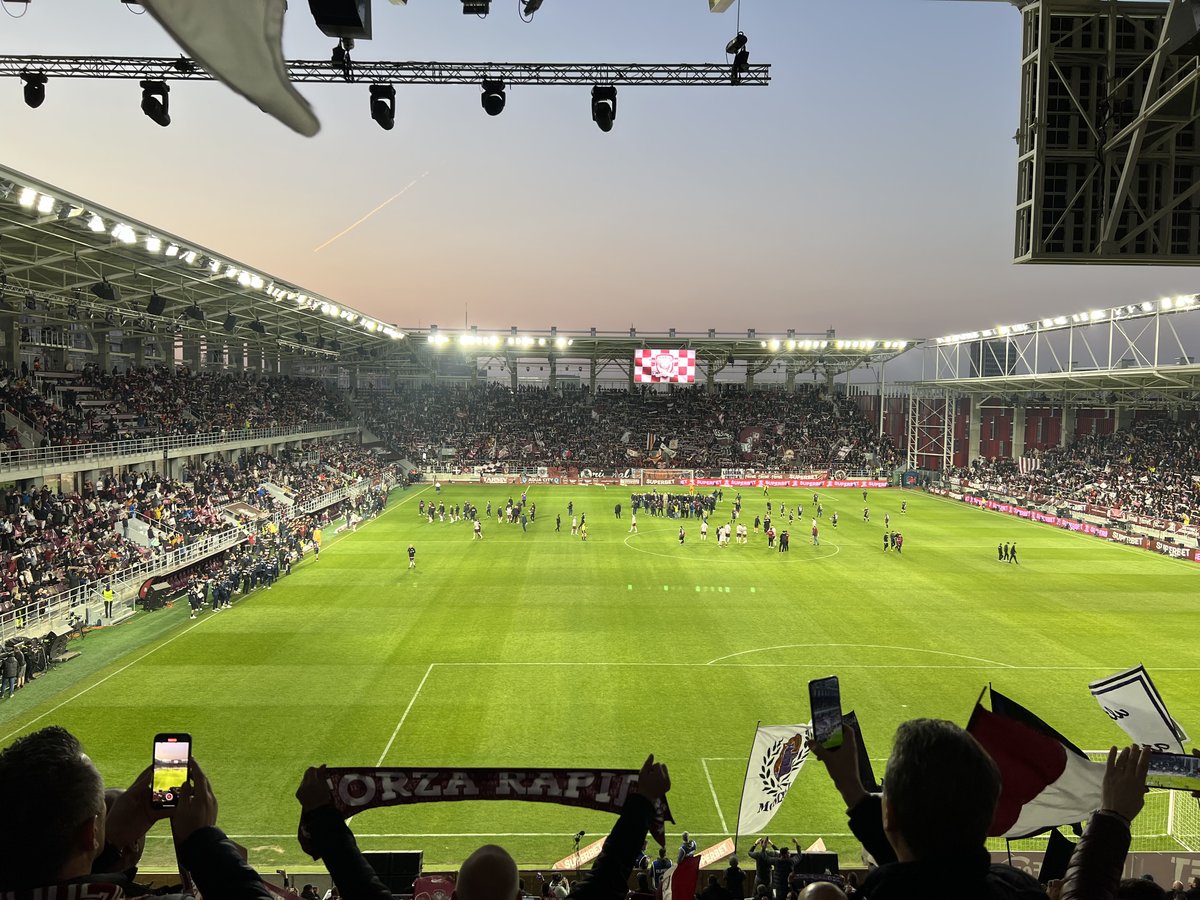 Rapid Arena stadium illuminated during its inauguration evening from South Stand view