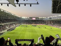 Rapid Arena stadium illuminated during its inauguration evening from South Stand view