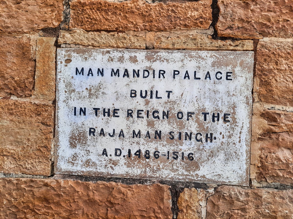 Man Singh Palace at Gwalior Fort, an intricately carved sandstone palace with colorful painted upper floors in Madhya Pradesh, India