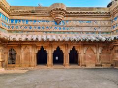 Man Singh Palace at Gwalior Fort, intricately carved sandstone palace with colorful upper floors in Madhya Pradesh