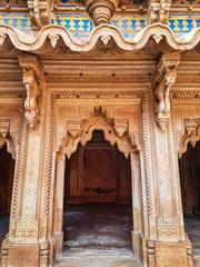 Intricately carved and colorfully painted Man Singh Palace with multiple floors at Gwalior Fort, Madhya Pradesh, India