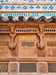 Man Singh Palace in Gwalior Fort, Madhya Pradesh showcasing intricately carved sandstone architecture and colorful upper floors