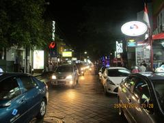 Legian Street at night bustling with activity and lights in Bali