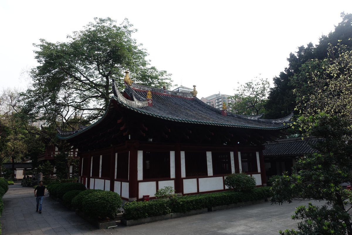 Interior view of a hall in Guangxiao Temple with traditional Chinese architectural elements
