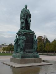Statue of Grand Duke Carl Friedrich of Baden looking towards the city center and the former Karlsruhe tax office building