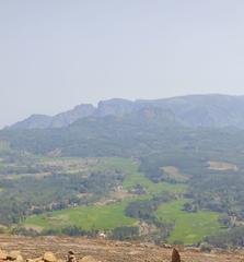 Scenic summer view of Ooty hill station with lush greenery and rolling hills