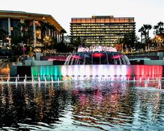 Grand Park fountain in Los Angeles illuminated in green, white, and red representing the Mexican flag