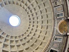 Interior of the Pantheon in Rome with large columns and a coffered dome