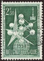 Belgium 1958 commemorative stamp featuring Atomium and World Exhibition emblem in dark green