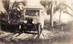 William Frost Layton sitting in a recreational vehicle on land later developed into Layton's Cottage, Trailer, and Fishing Park in Riviera Beach, Florida