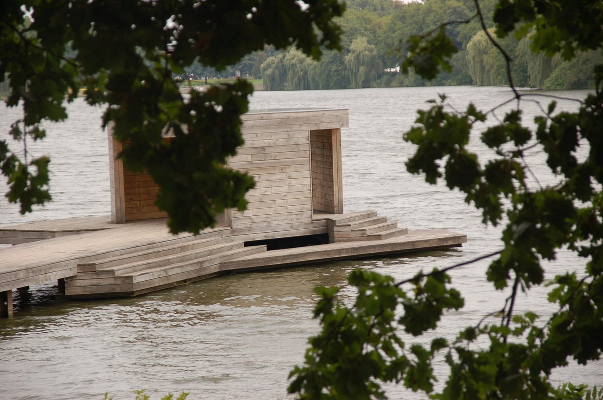 Pier extending into Aa lake in Münster during daylight
