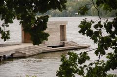 Pier extending into Aa lake in Münster during daylight