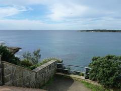 View of Bass and Flinders Point at Cronulla, New South Wales, Australia showing rocky coastline and ocean