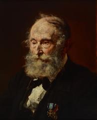 Portrait of Lukasz Dobrzanski, an elderly man with a gray beard, wearing a black tailcoat adorned with medals